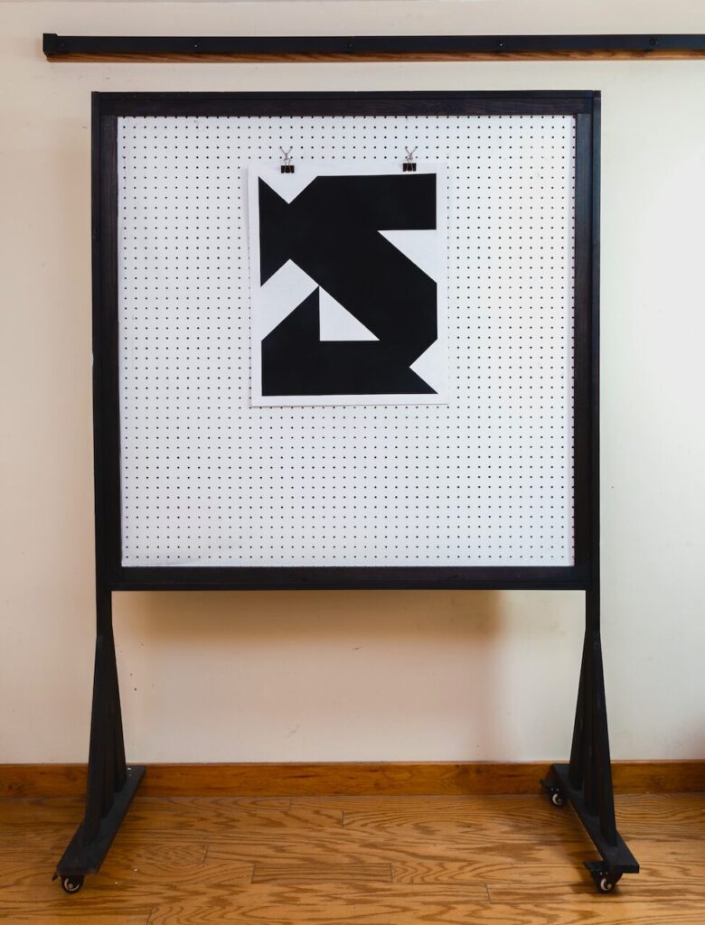 Wide view of minimalist abstract composition, showing color fields and divisions that suggest shifting recognition and emotional nuance.