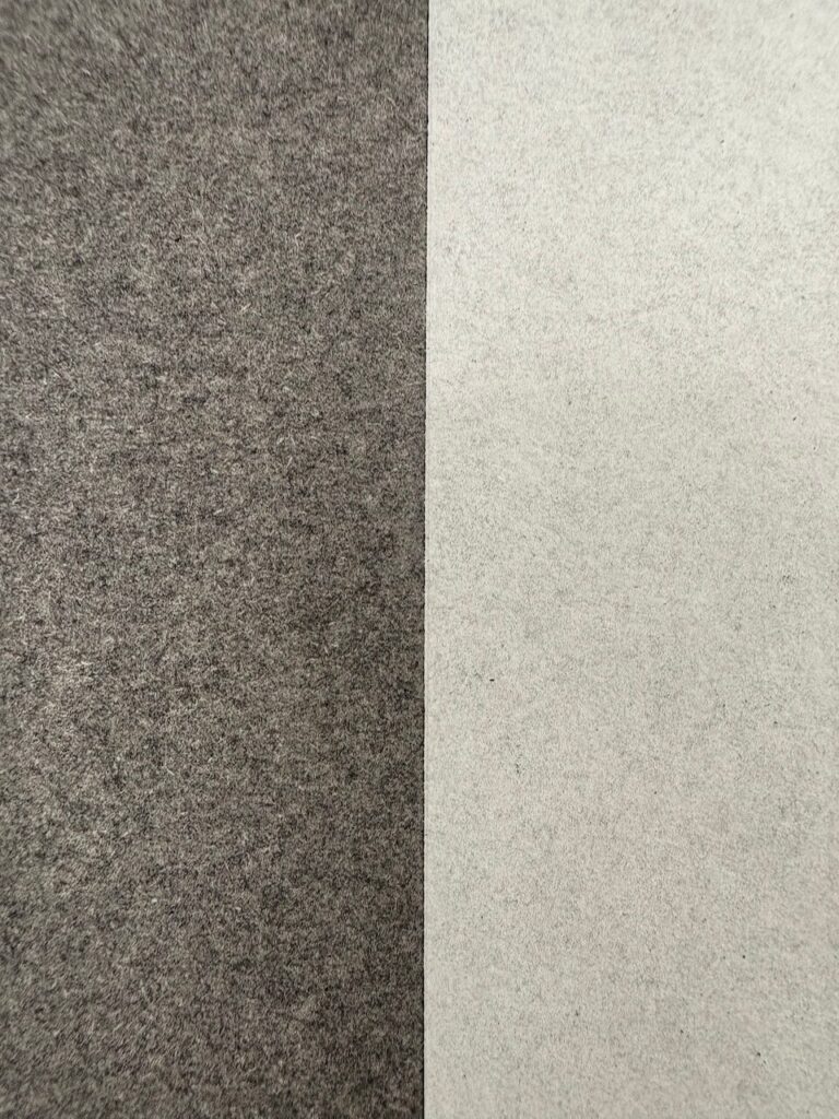 Close-up of Rectangles, No. 1, highlighting the smooth middle-gray charcoal ground and the tonal contrast between the faint graphite gray rectangle and the deep matte black rectangle.